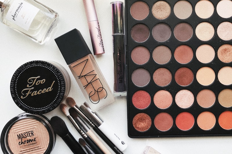 Person rinsing their hair under water with a calm, relaxed expression